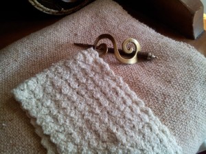 A linen shawl made by my grandmother. A cotton cloth made by me. A hair bauble given to me by my dear friend that was bought in Ireland. 